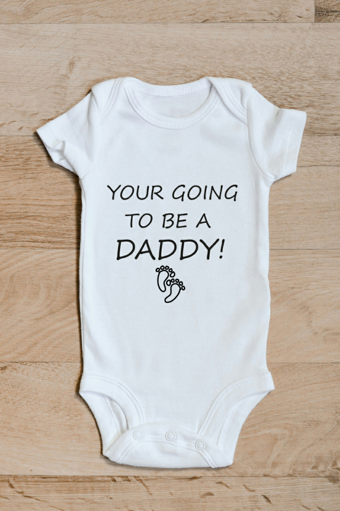 You're Going To Be A Daddy Baby Grow – Pregnancy Reveal Baby Vest for Dad-to-Be – You're Going To Be A Daddy baby grow showing the printed design on the front