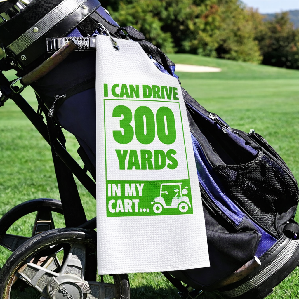 Funny Golf Towel – I Can Drive 300 Yards in My Cart – Funny golf towel printed with I can drive 300 yards in my cart, clipped to a golf bag