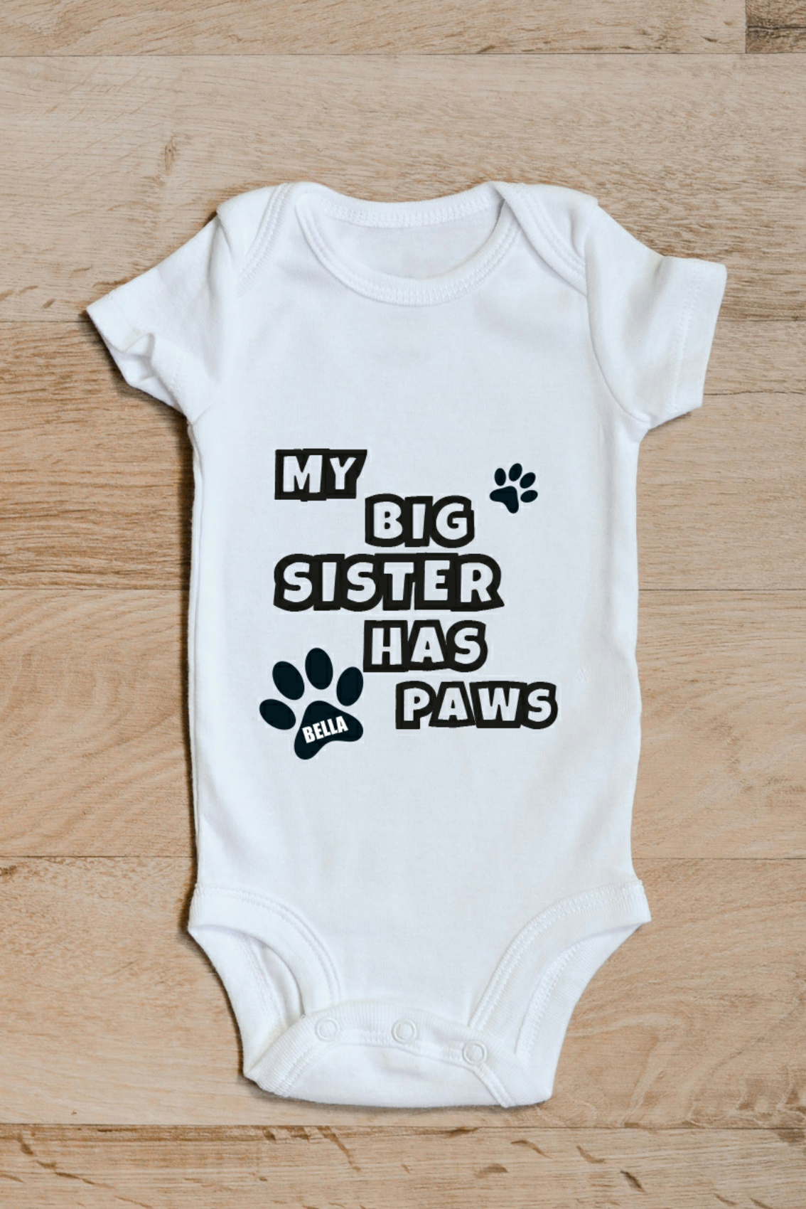 My Big Sister Has Paws Baby Grow – Dog & Cat Lover Baby Vest – New Baby & Pet Gift – My Big Sister Has Paws baby grow showing the printed design on the front