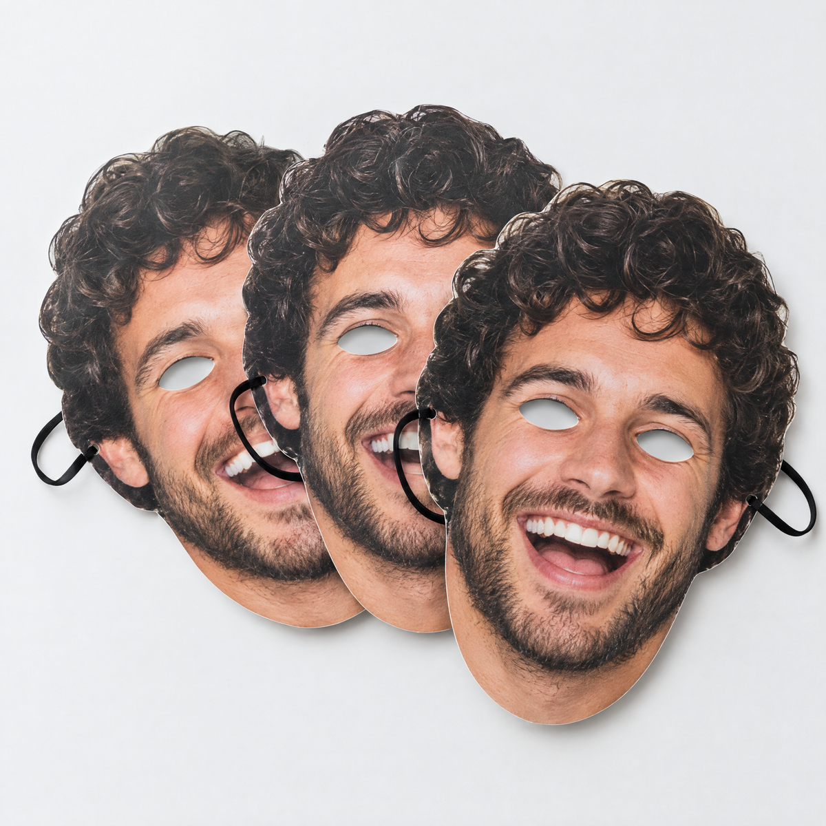 Stag do face masks printed with the groom's photo, three card masks with eye holes and elastic