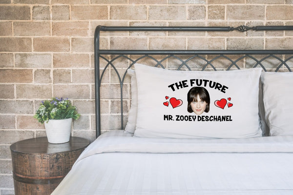 Future Mr Zooey Deschanel pillow case printed on a white pillow on a made bed