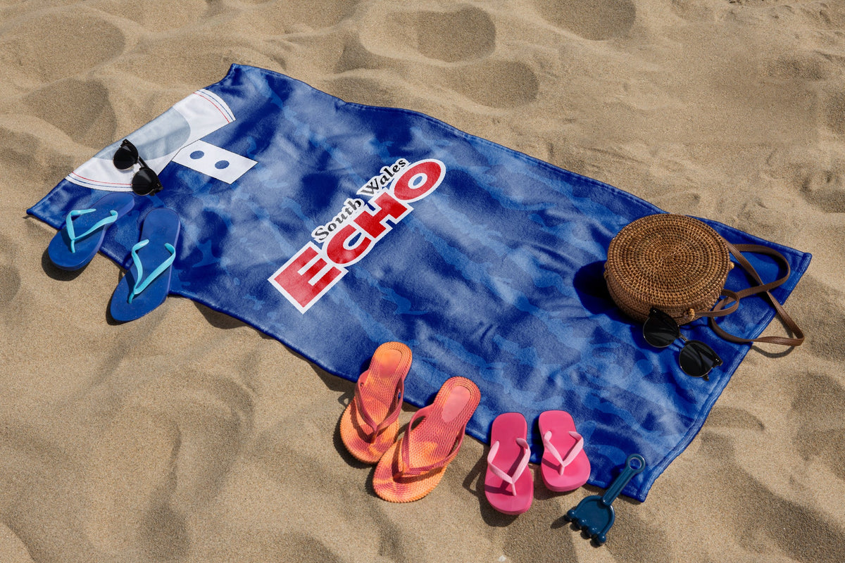 Cardiff 1992 Retro Football Lightweight Beach Gym Towel – Cardiff 1992 retro football lightweight beach gym towel laid out on the sand