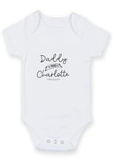 Flat mockup of the Daddy and baby design on a short-sleeve baby vest
