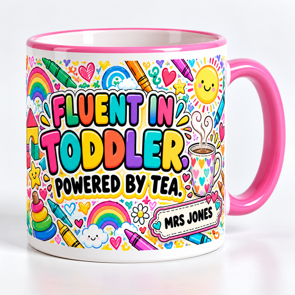 “Fluent in toddler. Powered by tea” personalised nursery teacher mug – studio photo