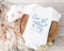 Personalised first Mother's Day baby grow with Our 1st Mother's Day design in blue, printed with baby's name