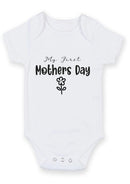 Flat mockup of the My First Mother's Day design on a short-sleeve baby vest