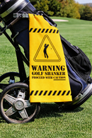 Funny golf shanker towel with Warning Golf Shanker Proceed With Caution, clipped to a golf bag