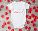 I love my Auntie baby grow showing the printed design on the front