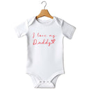 Flat mockup of the I love my Daddy Valentine's design on a short-sleeve baby vest
