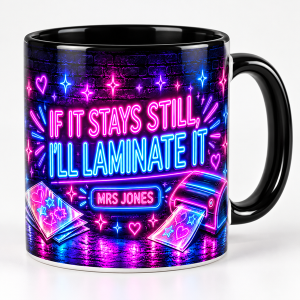 “If it stays still, I’ll laminate it” funny personalised teacher mug – studio photo