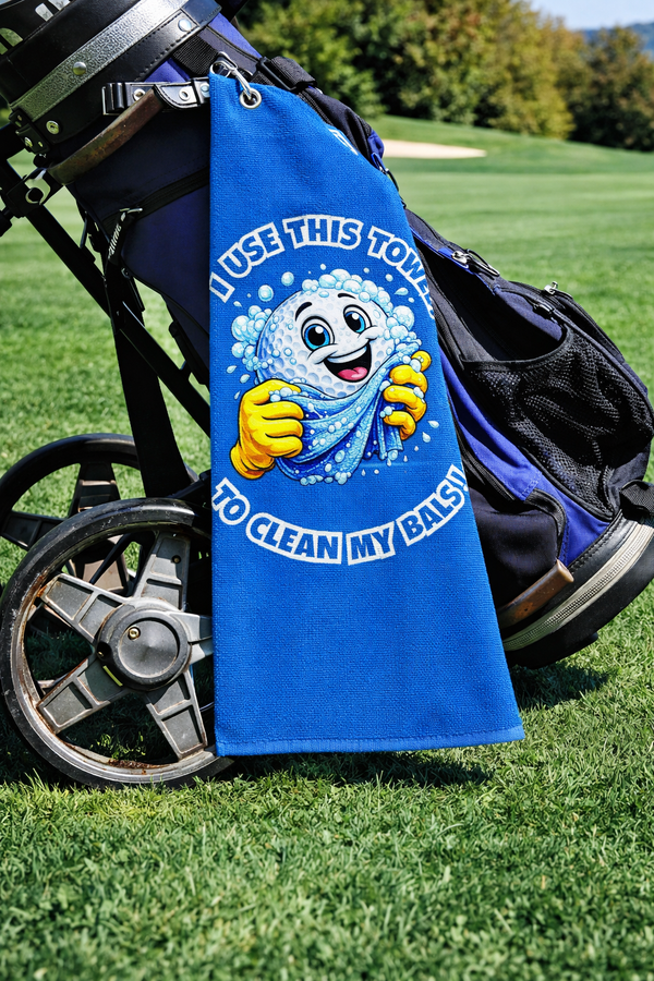 Rude golf towel reading I use this towel to clean my balls, design 1, on a golf bag