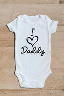 I heart Daddy baby grow showing the printed design on the front