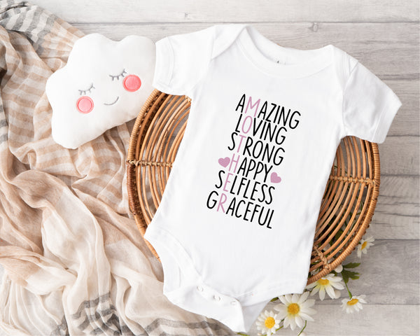 Personalised Mother's Day baby grow with Amazing Mother design in pink, printed with baby's name