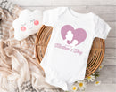 Personalised Mother's Day baby grow with Heart Silhouette design in pink, printed with baby's name