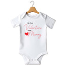Flat mockup of the My First Valentine is my Mummy design on a short-sleeve baby vest
