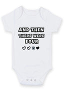 Flat mockup of the and then there were four design on a short-sleeve baby vest