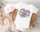 Personalised Mother's Day baby grow with Heart With Banner design in pink, printed with baby's name