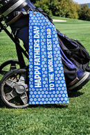 Father's Day golf towel with Happy Father's Day design, clipped to a golf bag