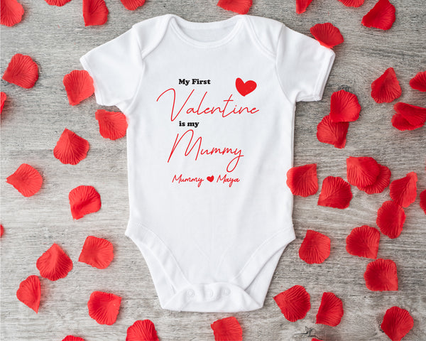 First Valentine Is Mummy name baby grow showing the printed design on the front