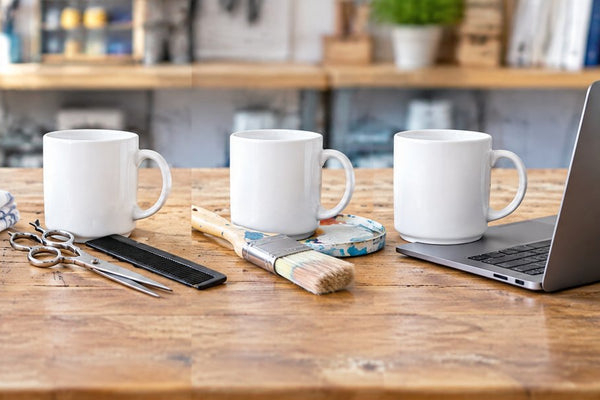 Occupational mugs banner: white mugs with tools from different trades