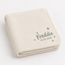 Personalised baby blanket in cream fleece with the name Freddie and birth date