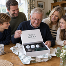 Grandad unwrapping a personalised golf gift set with printed balls