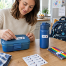 Parent sticking waterproof kids name labels with the name Jack on school items