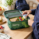 Personalised kids lunch box with the name Harry being packed for school