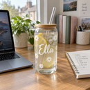 Personalised glass can cup with the name Ella on a home office desk