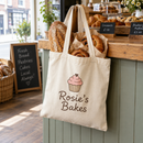 Personalised tote bag with a small bakery business name on a shop counter
