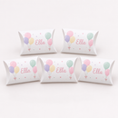 Personalised pillow treat boxes on a white background, showing an example personalised design