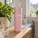 Personalised 20oz skinny tumbler with the name Grace on a bathroom shelf in the morning