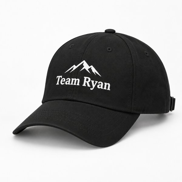Personalised cap in black printed with the text Team Ryan