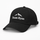 Personalised cap in black printed with the text Team Ryan