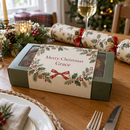 Personalised selection box sleeve on a Christmas dinner table