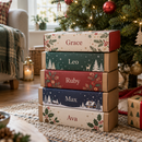 Pack of personalised selection box sleeves with different names under the tree