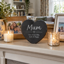 Personalised Mum slate heart on a mantelpiece among family photos