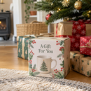 Mug gift box under a Christmas tree