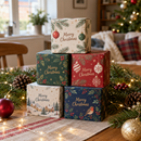 Stack of bauble gift boxes on a festive table