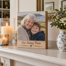 Personalised wooden photo block on a mantelpiece