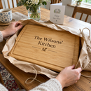 Personalised bamboo chopping board unwrapped as a housewarming gift