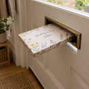 Personalised letterbox gift box for Chloe coming through the letterbox