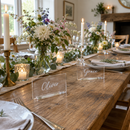 Personalised acrylic place names along a rustic wedding table