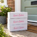 Stack of custom printed mailer boxes ready for posting