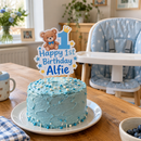 Personalised acrylic cake topper on a first birthday smash cake