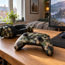 Custom games controller skin printed with the name Mia on a gaming desk