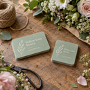 Rounded corner business cards on a florist's workbench