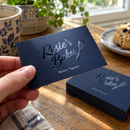 Spot gloss business cards showing the raised gloss finish