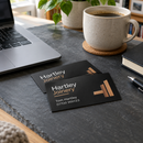 Metal business cards on a home office desk