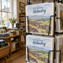 Custom printed postcards on a gift shop display